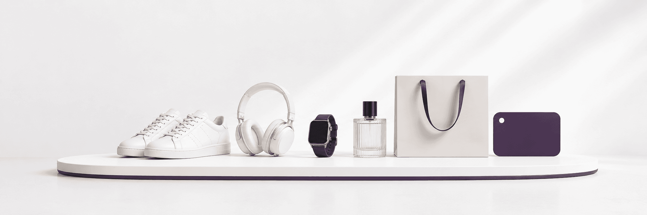 Shopping products including trainers, headphones, perfume and a shopping bag on a display.