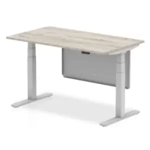 Air 1400 x 800mm Height Adjustable Desk Grey Oak Top Silver Leg With Silver Steel Modesty Panel