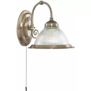 American diner 1-light wall light in antique brass with clear glass