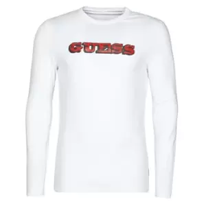 Guess GUESS PROMO CN LS TEE mens in White. Sizes available:XXL,S,M,L,XL,XS