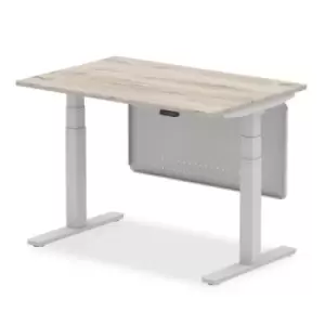 Air 1200 x 800mm Height Adjustable Desk Grey Oak Top Silver Leg With Silver Steel Modesty Panel