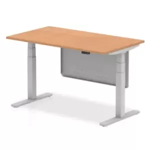 Air 1400 x 800mm Height Adjustable Desk Oak Top Silver Leg With Silver Steel Modesty Panel
